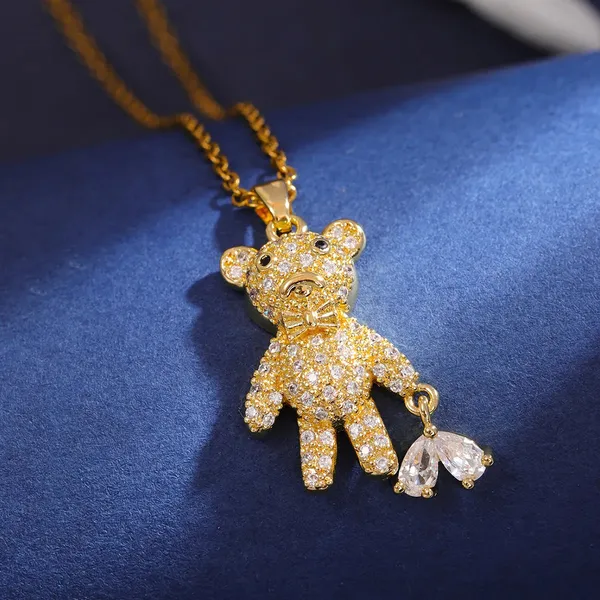 Gold_Heart_Pulling_Bear_Pendants_For_Women